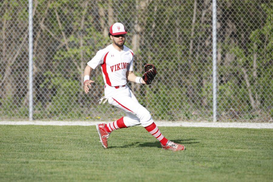 Senior outfielder Percy Walters catches a ball in the outfield. Walters has three home-runs this season. 