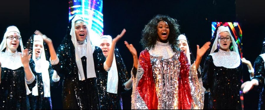 Practice makes perfect: The Sister Act cast practices in costume on stage. On Friday Nov. 10, the  
performance sold 693 out of 700 tickets. 