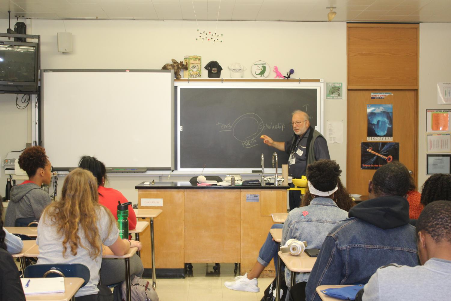 Avid researcher: Dr. Howard Fingert giving a presentation in Mr. Knoepke's 2nd period AP Biology class on Sept. 28. Fingert discussed how he entered into the medical field and some of his research with students.