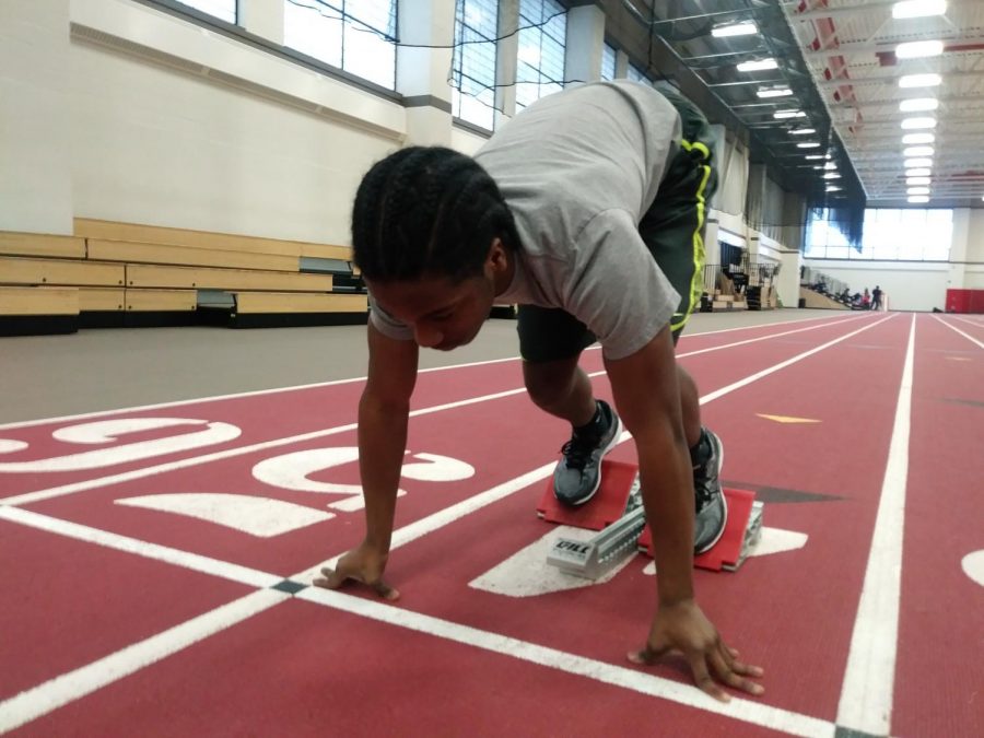 Sophomore sprinter Marshall Ellis practices his sprints at a practice in the field house. The varsity boys track team looks to get off to a fast start in a quad meet at the field house next Saturday.