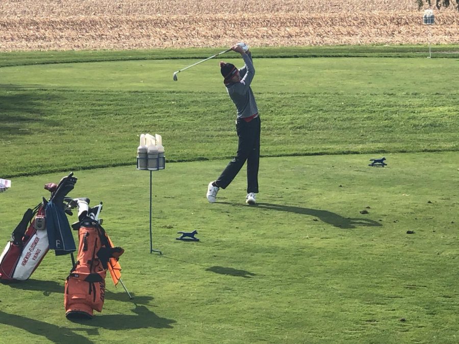 Junior Quinn Henry takes a swing at the State Finals in Bloomington last Saturday. He scored an 87 to finish a season to remember.