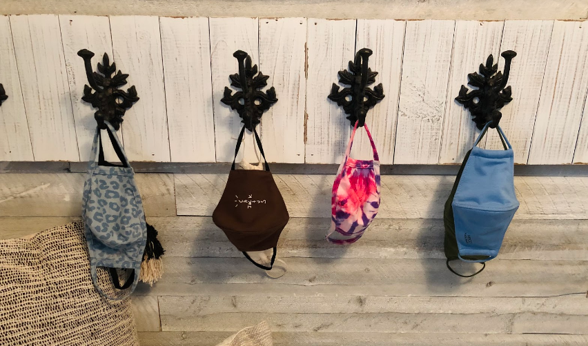 Where do you keep your masks?    Mask wearing is a common practice in 2020. Pictured, masks are displayed on hooks right by the front door for easy access before leaving. 