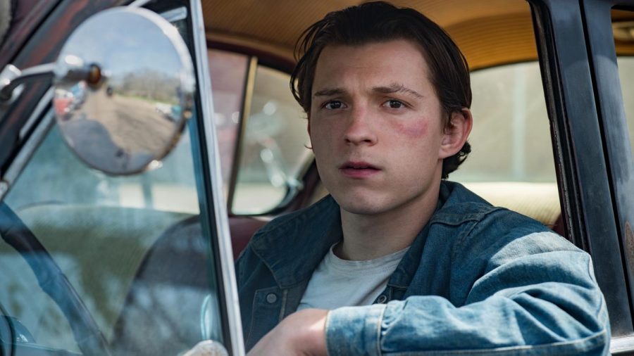 Tom Holland in The Devil All the Time. Hollands character Arvin has a lot of personal realization and growth throughout the film.