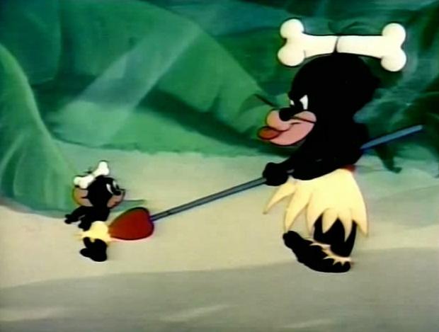 A Problematic Image: This still frame comes from the show Tom and Jerry (Episode 59). The image shows two people that are supposed to be native villagers. The small one is really Jerry (the main character of the show) who painted the black paint on himself to blend in with the villagers.