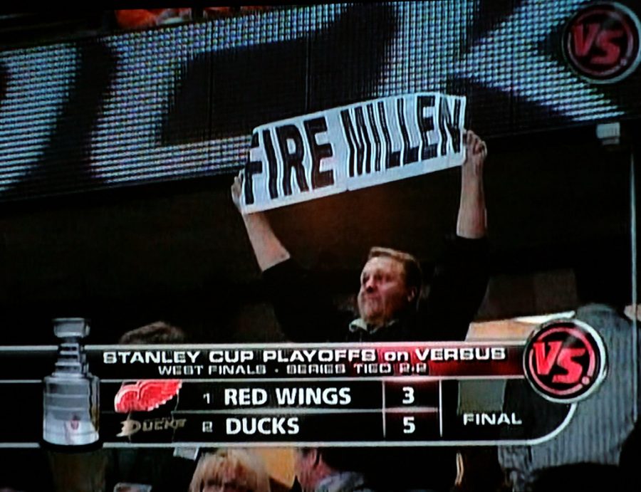 A fan attending game four of the NHL 2007 Western Conference Final Series, is seen holding up a sign showing his displeasure towards Detroit Lions GM Matt Millen, who finished the 2006-07 season with a record of 3-13.