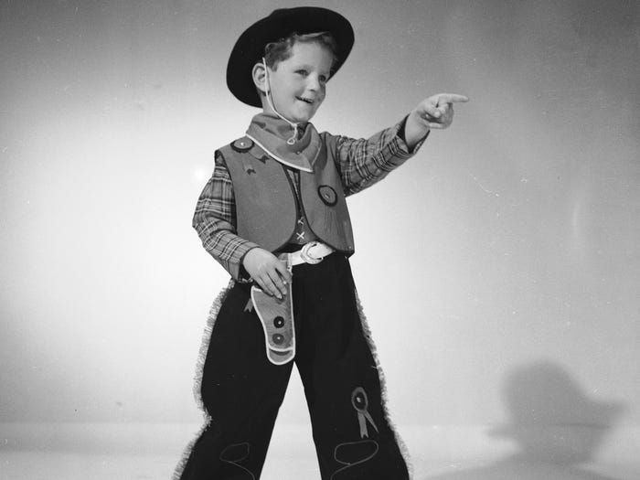 Boy dressed as a cowboy, 1953