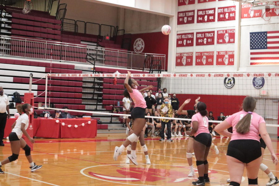 Spike! Lady Vikings score a point in a matchup against Marian Catholic H.S