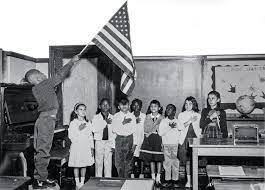 Kids in 1963 standing for the Pledge of Allegiance in a Chicago school