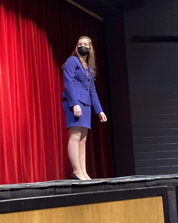 Stella Hoyt performing at a speech competition.