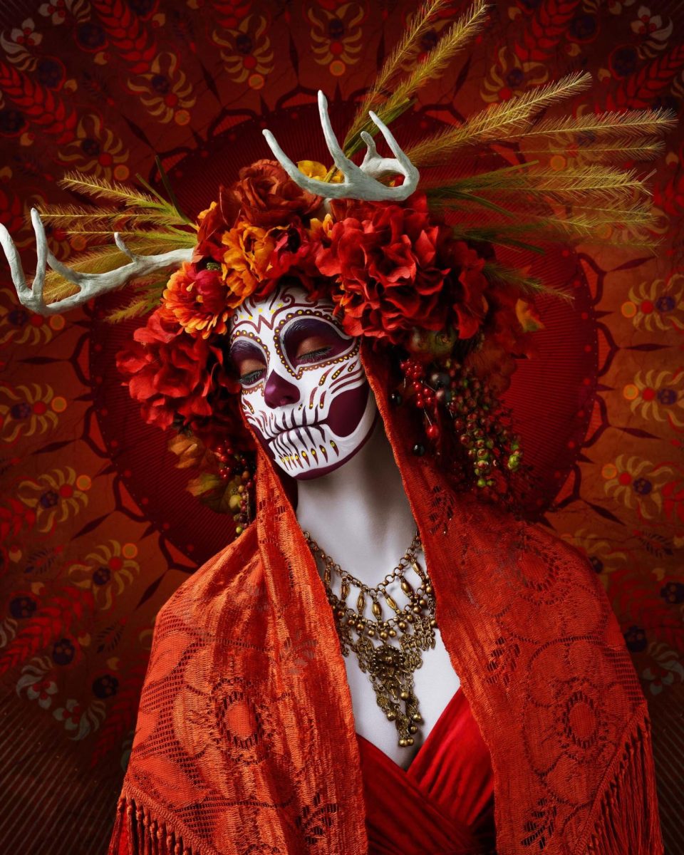 Traditions! An example of traditional clothing and makeup worn on Dia De Los Muertos