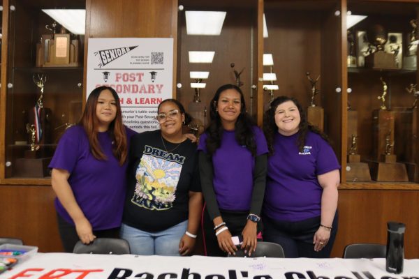 Danielle Scott, A'mya Petty, Itzel Nunez-Rosario, and Elizabeth Hackett at the H-F Friends of Rachel banner signing.