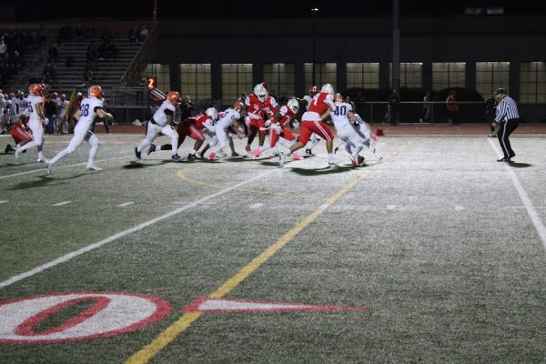 Homewood-Flossmoor Vikings charge down the field against Naperville North High School.