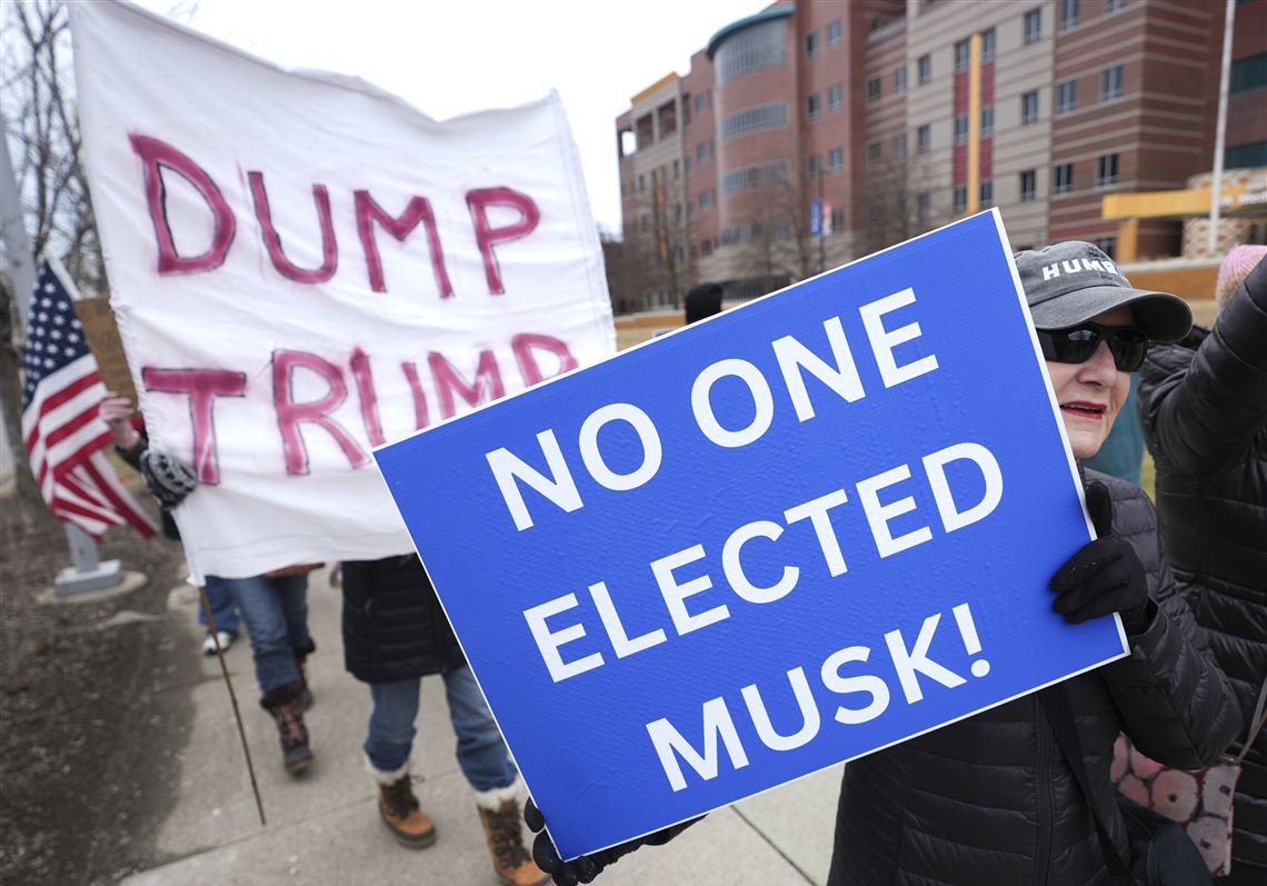 Protesters outside the John D. Dingell Veterans Affairs Medical Center in Detroit on Feb. 28.