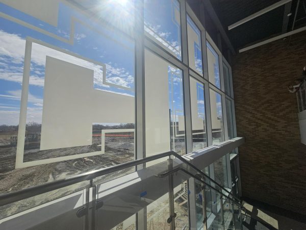 Window in the new science wing with the HF logo on it.