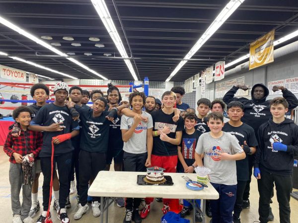 Members of the Harvey boxing club taking a picture at the end of the session.