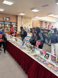 Our students are bibliophiles! Students explore the library during the Book fair.