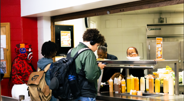 Yummy! H-F students wait in line to receive new lunch items.
