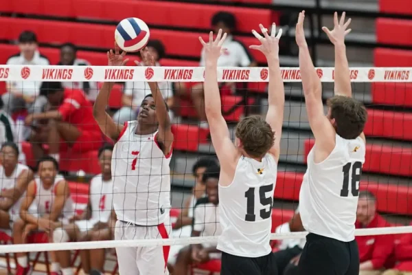 Freshman Surendran Heyward putting up a set at the net against Andrew on May 1.