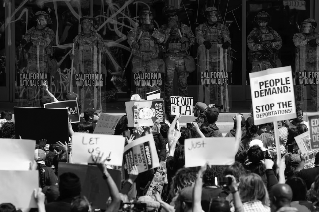 National Guard deployed in California while protestor express their anger against immigration practices. 