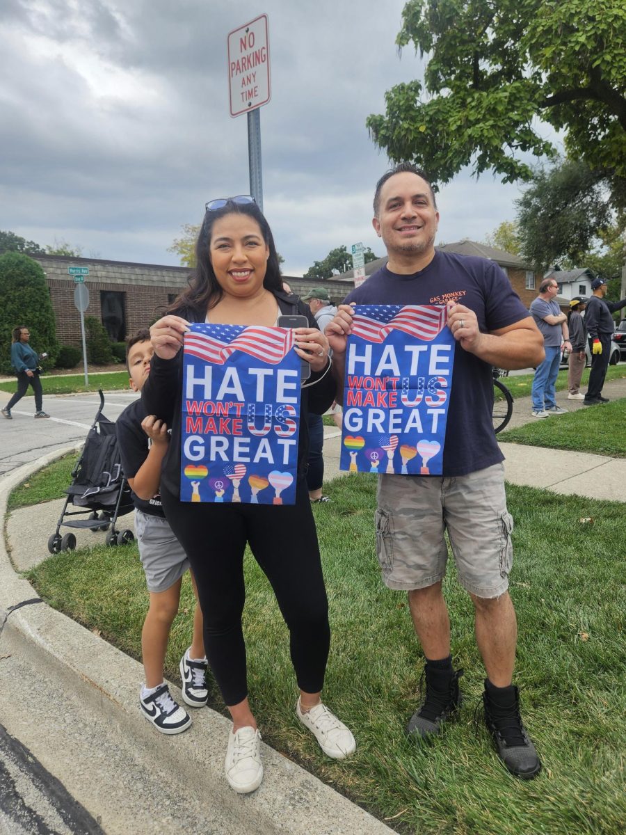 Family goes to protest with their children to show what they believe in.