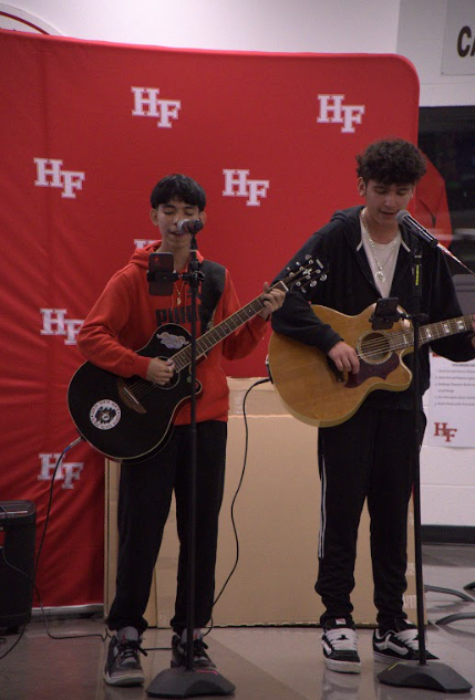 Fernandez and Medrano performing at Noche Cultural.