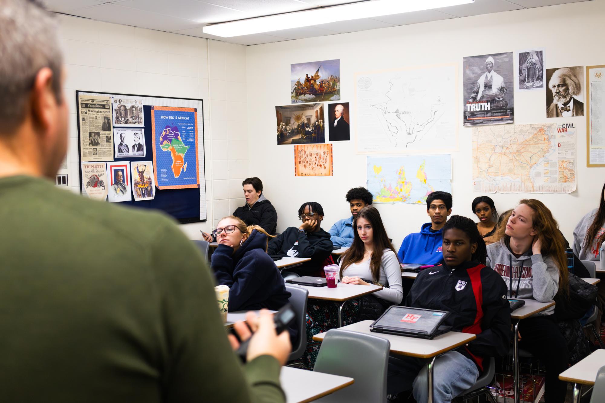 Theory of Knowledge teacher Ted Venegas  talks to TOK students about upcoming essay