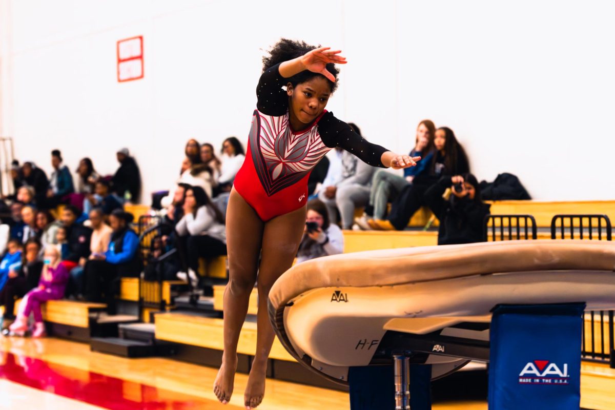Vaulted! Safiya Douglas looks on as she approaches the vault mid-air.