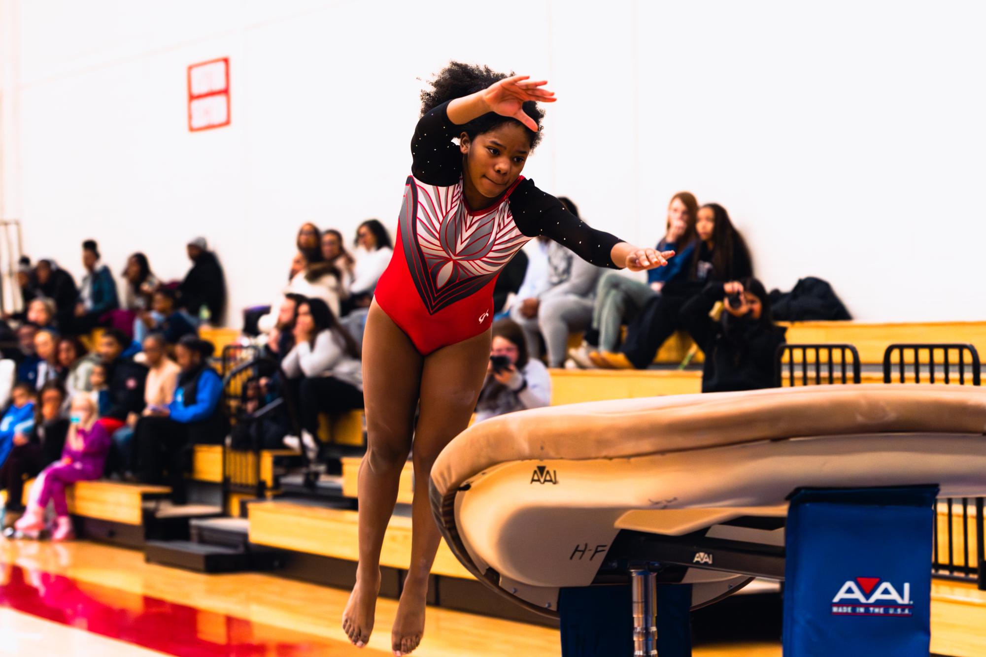 Vaulted! Safiya Douglas looks on as she approaches the vault mid-air.
